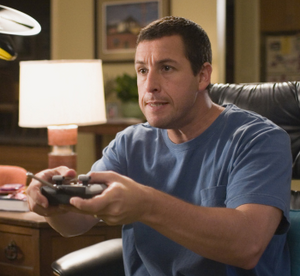 Adam Sandler partaking in 'gaming'.png